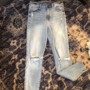 Light wash super stretch ripped jeans